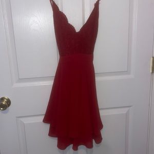 red lacey dress with a cross back
